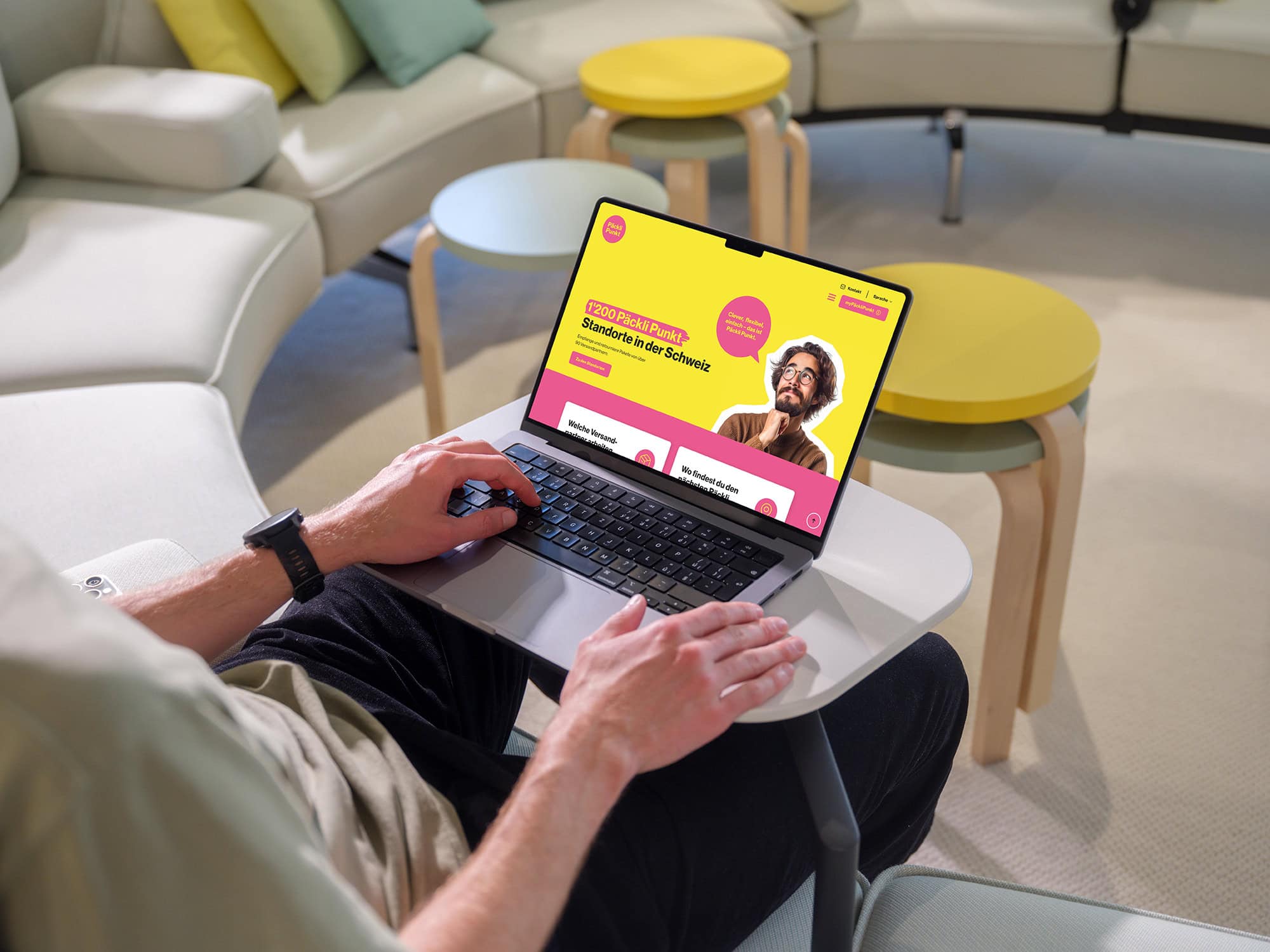 2mockuuups macbook pro mockup with a man in a casual workspace scaled