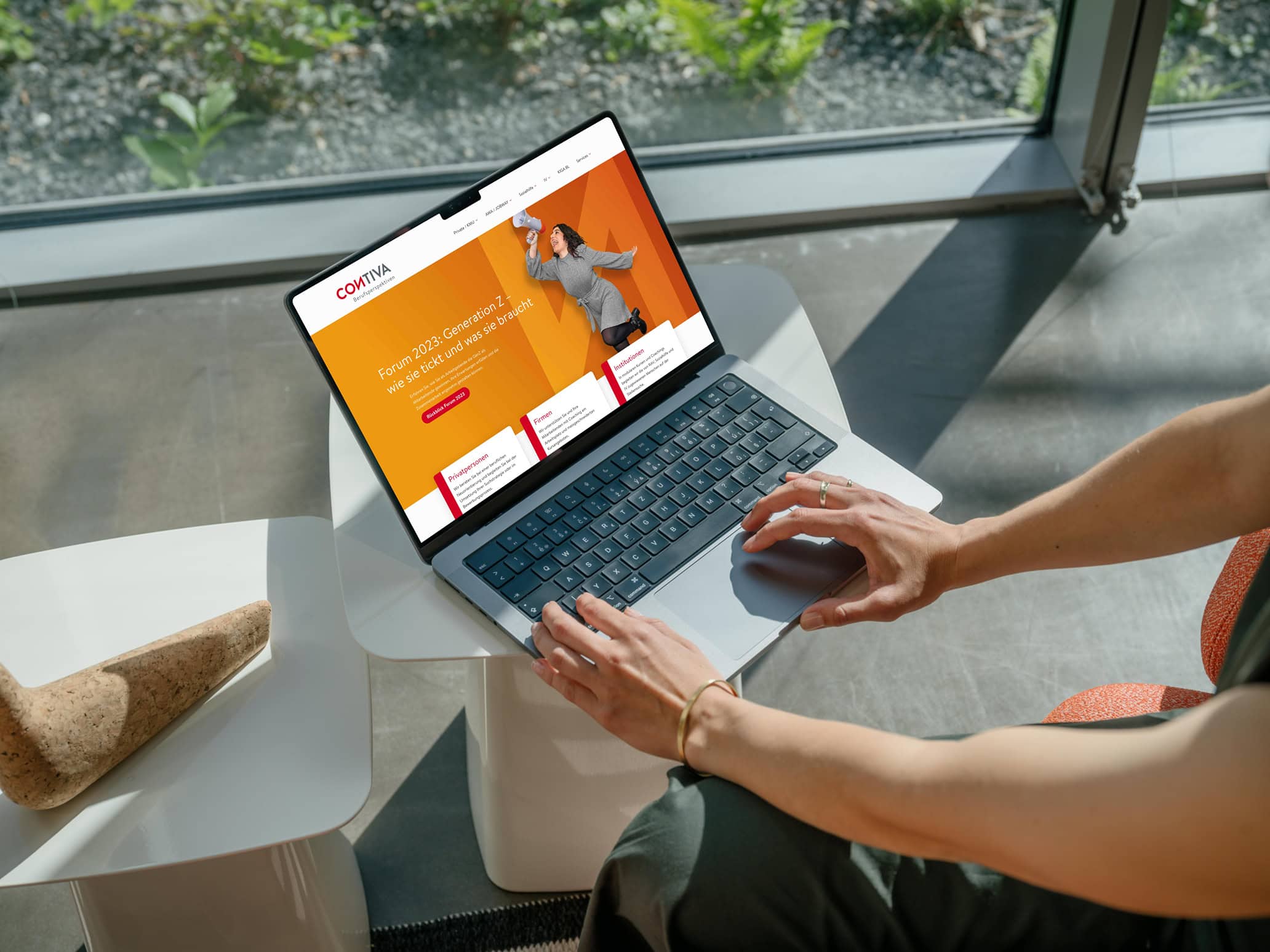 mockuuups free macbook pro with female professional