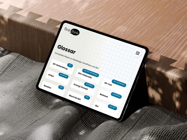 Mockuuups Free iPad Pro mockup on textured fabric and wooden surface scaled