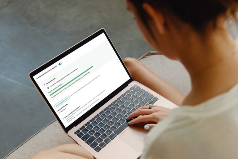 mockuuups woman working on a macbook air mockup neu scaled